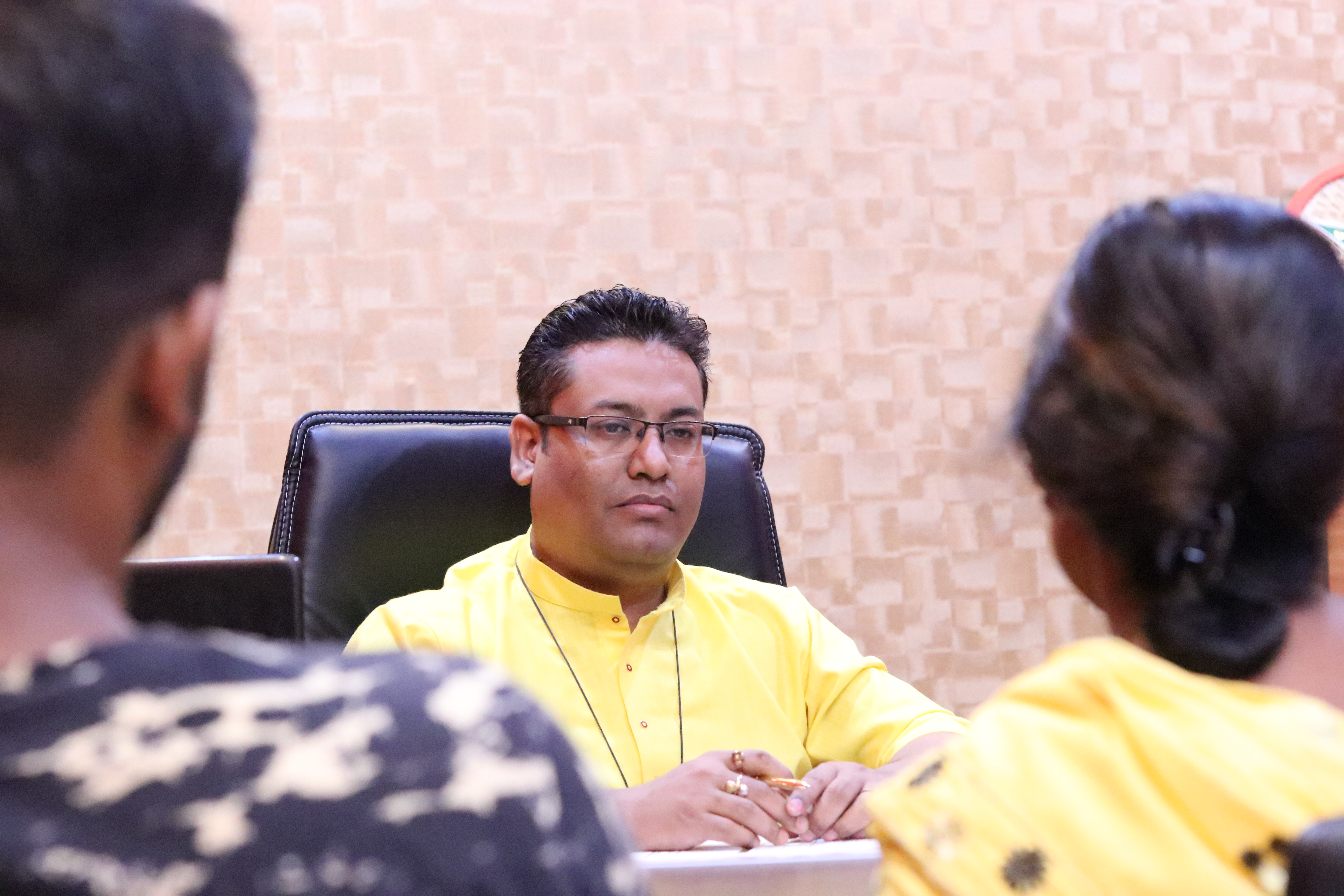 Dr. Vikram Talukdar during a personal consultation