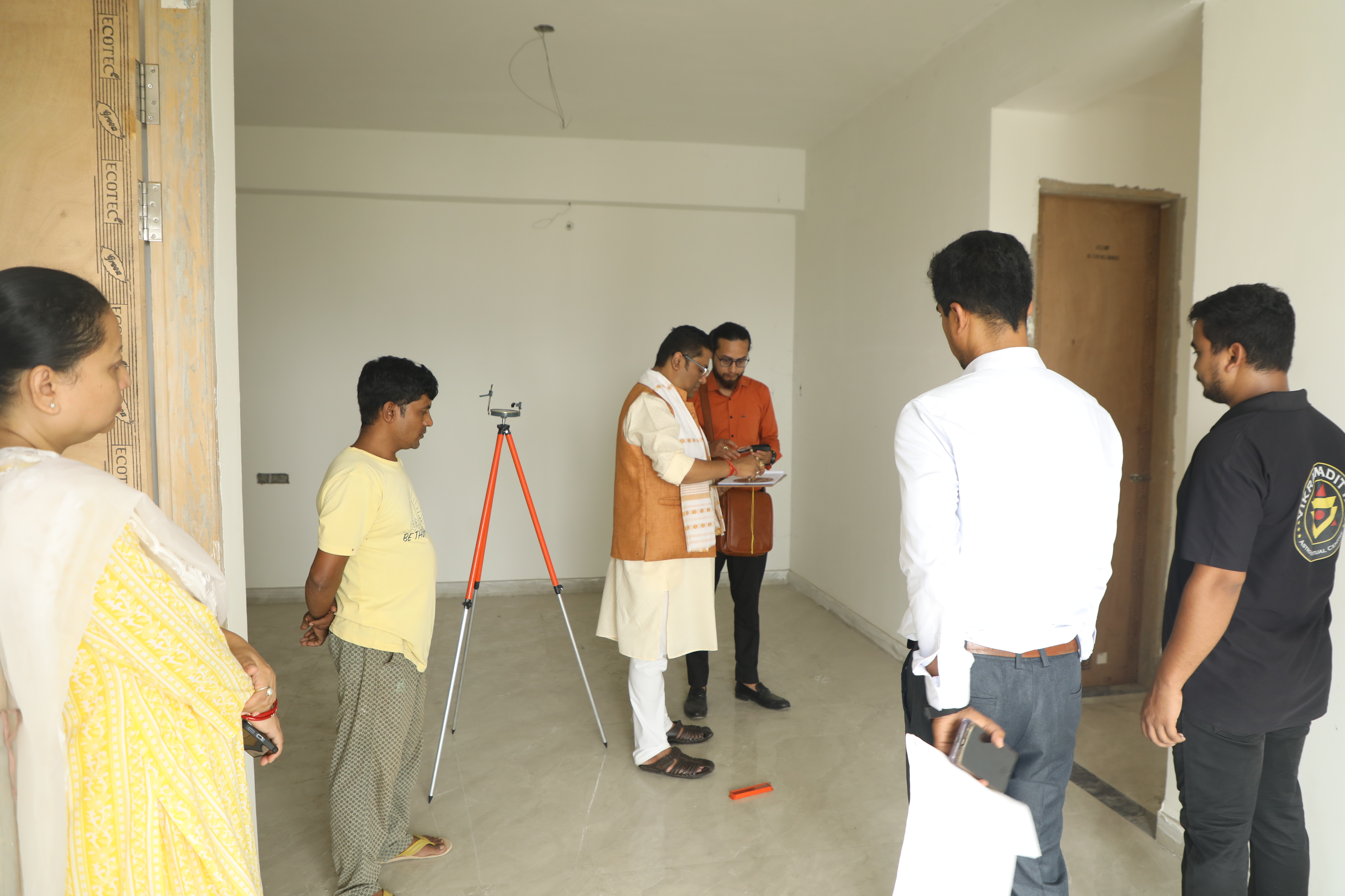 Dr. Vikram Talukdar with visitors during a Vastu assessment