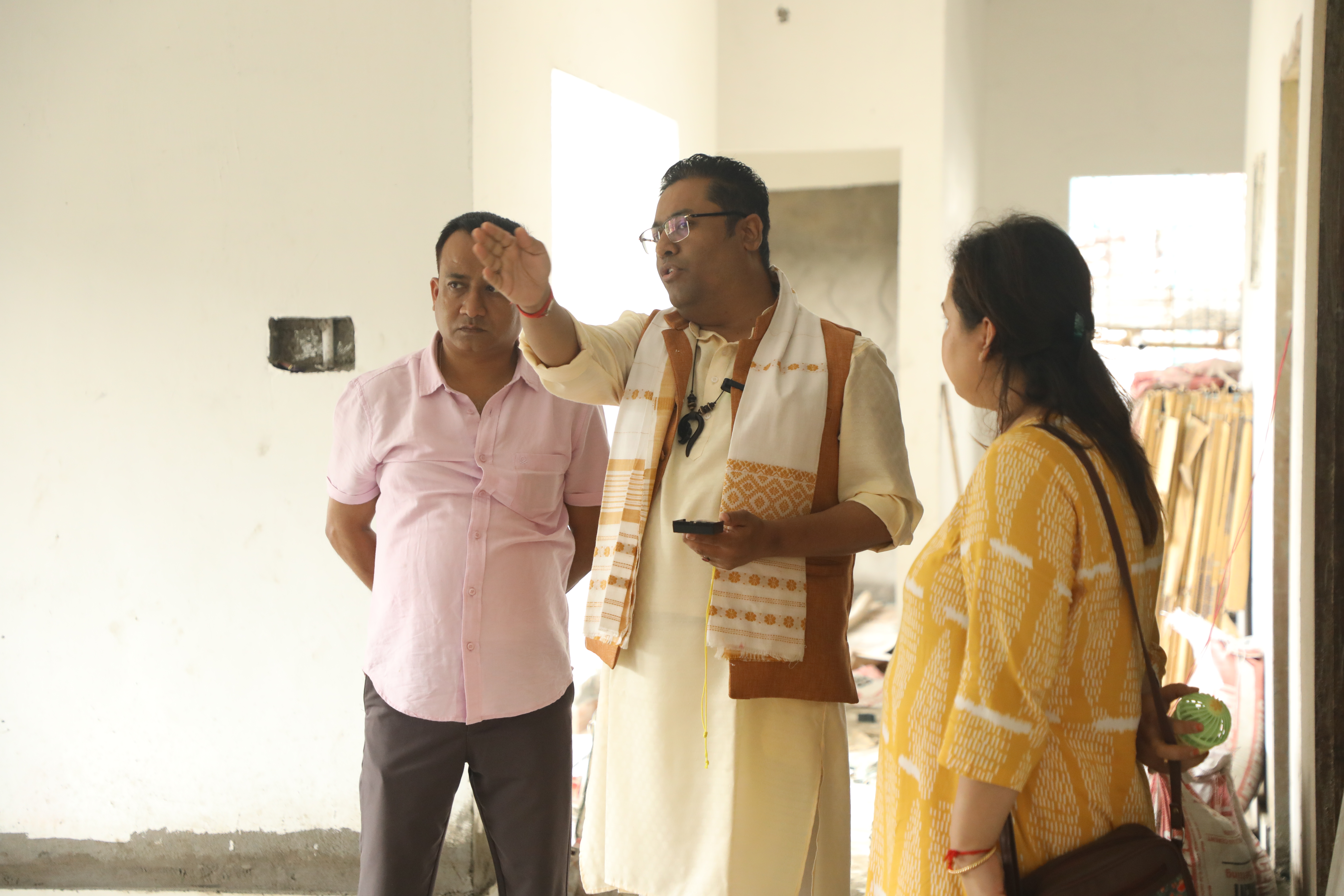Dr. Vikram Talukdar providing guidance during a home visit