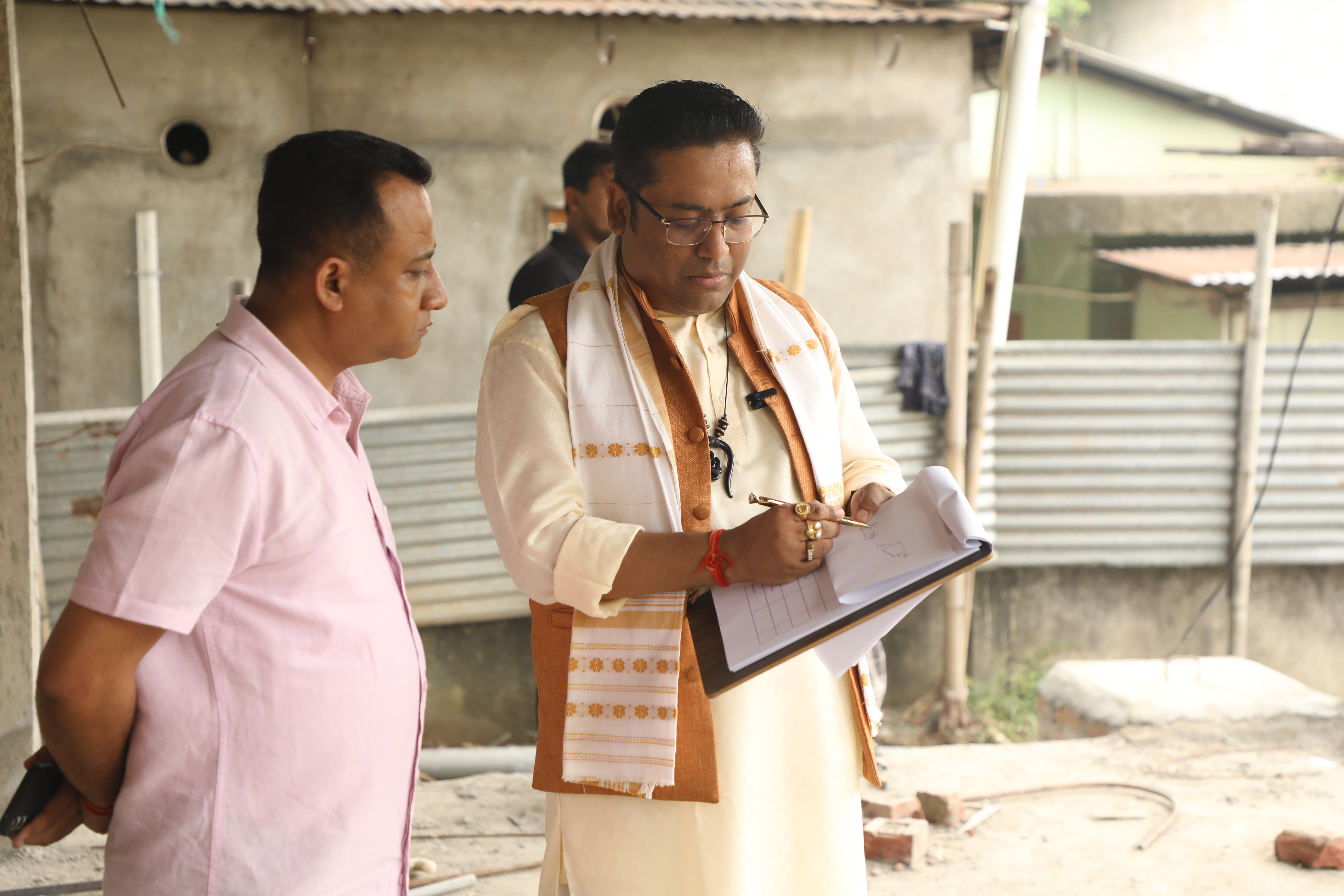 Dr. Vikram Talukdar discussing Vastu with a client